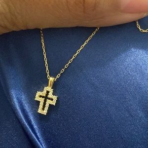 18karat pure gold cross necklace with diamonds 16 inch.